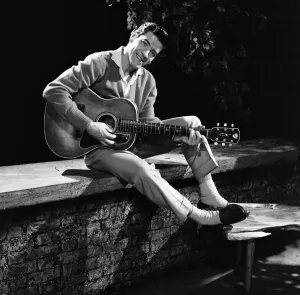 Singer Michael Holliday poses with guitar. 26th September 1958 Singer Michael Holliday poses with guitar. 26th September 1958