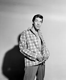 Singer Michael Holliday poses wearing check shirt. 24th November 1957 Singer Michael Holliday poses wearing check shirt. 24th November 1957