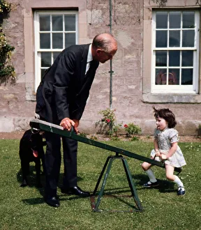 Sir Alec Douglas Home playing with his grand-daughter 1973 Sir Alec Douglas Home playing with his grand-daughter 1973