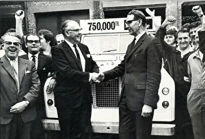 Sir George Farmer congratulating production manager Mr James Lawrence as the 750 Sir George Farmer congratulating production manager Mr James Lawrence as the 750
