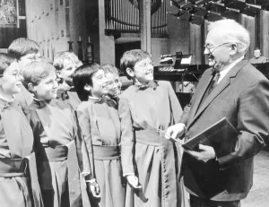Sir Harry Secombe chats with some of the choirboys during a break in making the TV Sir Harry Secombe chats with some of the choirboys during a break in making the TV