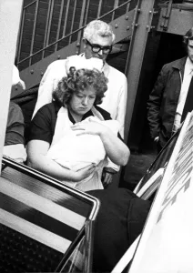 Sister Brown carries Louise Brown ( the World's first test tube baby Sister Brown carries Louise Brown ( the World's first test tube baby
