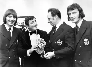 Three sky-divers who made a sponsored parachute jump for charity handed over £ Three sky-divers who made a sponsored parachute jump for charity handed over £