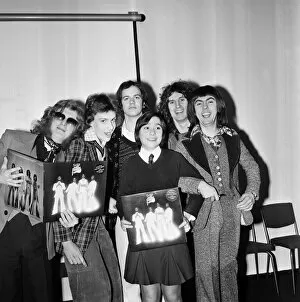 Images Dated 28th February 1975: Slade (l-r Noddy Holder, Jim Lea, Don Powell and Dave Hill) pictured with prize winners