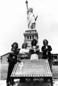 Slade pop group visit The Statue of Liberty 1975 Dave Hill Noddy Holder Don Powell Slade pop group visit The Statue of Liberty 1975 Dave Hill Noddy Holder Don Powell