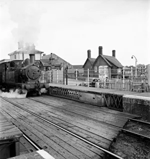 A small tank engine pulls into the railway station at Halesworth Suffolk A small tank engine pulls into the railway station at Halesworth Suffolk