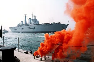 Smoke from flares welcomes HMS Invincible return to Portsmouth from the Falklands Smoke from flares welcomes HMS Invincible return to Portsmouth from the Falklands