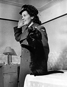 Smoky the cat February 1943 Miss Ann Twynam and the cat she rescued in 1940 Smoky the cat February 1943 Miss Ann Twynam and the cat she rescued in 1940
