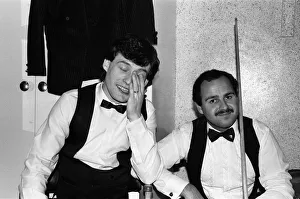 Snooker player Jimmy Whiteshares a joke with a fellow snooker player in the dressing room Snooker player Jimmy Whiteshares a joke with a fellow snooker player in the dressing room