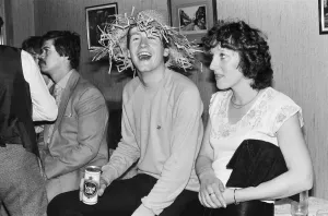 Snooker player Steve Davis letting his hair down wearing a straw hat and having a beer Snooker player Steve Davis letting his hair down wearing a straw hat and having a beer