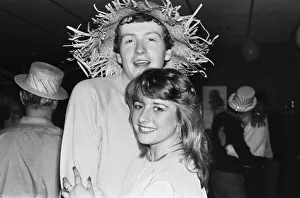 Snooker player Steve Davis wearing a straw hat with a young fan. 8th June 1981 Snooker player Steve Davis wearing a straw hat with a young fan. 8th June 1981