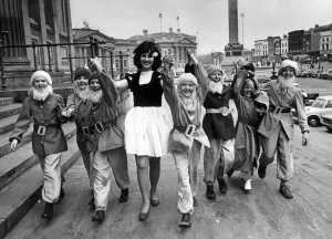 Snow White in Liverpool in the shape of Chester actress Vivien Day, with her seven dwarfs Snow White in Liverpool in the shape of Chester actress Vivien Day, with her seven dwarfs