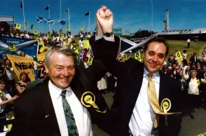 SNP leader Alex Salmond lifts Allan Macartney's arm after his stunning victory SNP leader Alex Salmond lifts Allan Macartney's arm after his stunning victory