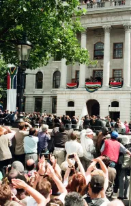 South African President Nelson Mandela addressing the crowds from the balcony of South South African President Nelson Mandela addressing the crowds from the balcony of South