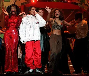 Spice Girl Mel B dancing and singing on stage at the 1996 Smash Hits Pole Winners Party Spice Girl Mel B dancing and singing on stage at the 1996 Smash Hits Pole Winners Party