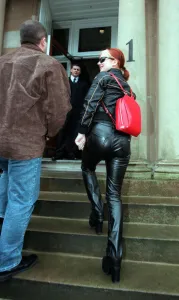 Spice Girls Geri Halliwell wearing black leather trousers sunglasses red bag April 1998 Spice Girls Geri Halliwell wearing black leather trousers sunglasses red bag April 1998