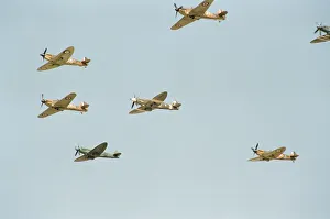 Spitfires and Hurricanes seen here during the flypast to commemorate the 50th Anniversary Spitfires and Hurricanes seen here during the flypast to commemorate the 50th Anniversary