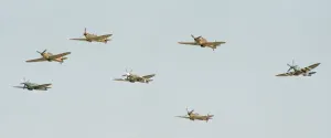 Spitfires and Hurricanes seen here during the flypast to commemorate tge 50th Anniversary Spitfires and Hurricanes seen here during the flypast to commemorate tge 50th Anniversary