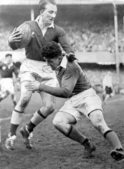 Sport - Rugby - Wales v Ireland - Lewis Jones, the young Welsh full back is seen avoiding Sport - Rugby - Wales v Ireland - Lewis Jones, the young Welsh full back is seen avoiding