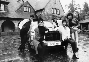 Five Star pop group stand outside mansion in Berkshire with new Rolls Royce Dbase Five Star pop group stand outside mansion in Berkshire with new Rolls Royce Dbase