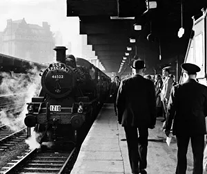 Steam billows around the London Midland & Scottish Railway Class 2F Ivatt locomotive Steam billows around the London Midland & Scottish Railway Class 2F Ivatt locomotive