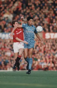 Steve Bruce finds his way barred by Robert Rosario's elbow during Coventry City' Steve Bruce finds his way barred by Robert Rosario's elbow during Coventry City'