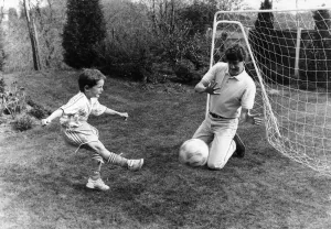 Steve Bruce, Manchester United Central Defender, playing football at home with son Alex Steve Bruce, Manchester United Central Defender, playing football at home with son Alex