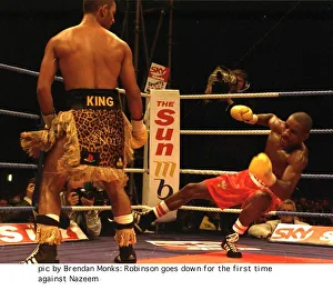 Steve Robinson hits the canvas floored by Prince Naseem Hamed during WBO featherweight Steve Robinson hits the canvas floored by Prince Naseem Hamed during WBO featherweight