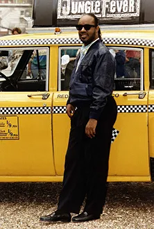 Stevie Wonder Singer arrives at his press conference in an New York yellow cab Stevie Wonder Singer arrives at his press conference in an New York yellow cab