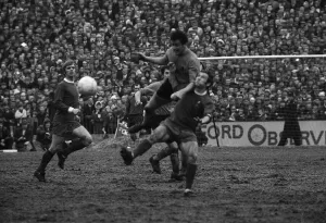 Stewart Scullion heads ball from Ian Callaghan during FA cup game 1970 Stewart Scullion heads ball from Ian Callaghan during FA cup game 1970