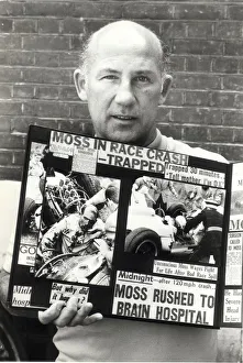 stirling moss with cuttings of his crash aug 1982 ----- stirling moss with cuttings of his crash aug 1982 -----