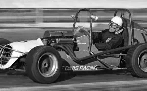 Images Dated 1st December 1971: Stirling Moss rying out midget racing car at White City racing track - December 1971