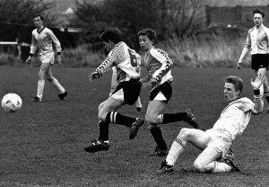 Stockton v Marton, 30th April 1989. Lee Paterson slides in to tackle for Stockton but Stockton v Marton, 30th April 1989. Lee Paterson slides in to tackle for Stockton but