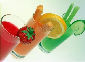 Strawberry Orange and Lime Fruit Juice in glasses June 1999 Strawberry Orange and Lime Fruit Juice in glasses June 1999