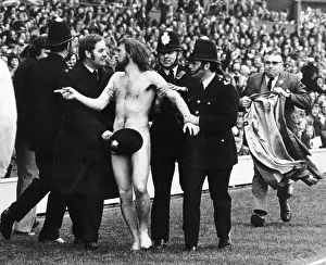 Streaker male nude naked man on pitch at Twickenham police cover him up with hat Streaker male nude naked man on pitch at Twickenham police cover him up with hat