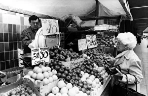 A street trader on the streets of Newcastle selling fruit A street trader on the streets of Newcastle selling fruit