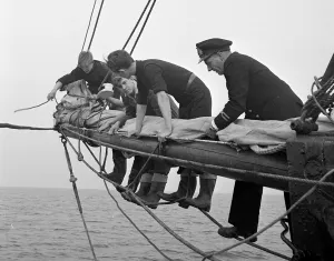 Students attending the Outward Bound Sea School at Aberdovey seen here with one of Students attending the Outward Bound Sea School at Aberdovey seen here with one of