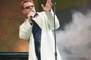 Suggs, lead singer of British ska group Madness, performing at Party in the Park at Hyde Suggs, lead singer of British ska group Madness, performing at Party in the Park at Hyde