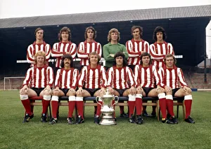 The Sunderland FA Cup winning team pose with the trophy at their Roker Park ground The Sunderland FA Cup winning team pose with the trophy at their Roker Park ground