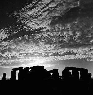Images Dated 10th August 1975: Sunset over Stonehenge in Wiltshire Britain Sunset Silhouette Clouds Druids Country Scene