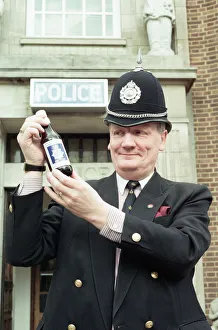 Supt Roger Bagley of Dudley Police with a bottle of 'Bobby Bitter's" Supt Roger Bagley of Dudley Police with a bottle of 'Bobby Bitter's"