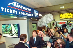 Surrounded by television crews and journalists Tony Blair tours the newly opened terminal Surrounded by television crews and journalists Tony Blair tours the newly opened terminal