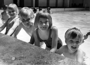The three surviving Thorns sextuplets with their younger brother David at the swimming The three surviving Thorns sextuplets with their younger brother David at the swimming