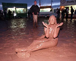 T in the Park July 1997 A music fan covered in mud at the T in the Park music festival T in the Park July 1997 A music fan covered in mud at the T in the Park music festival
