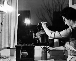 Tea making during Power Cuts, 11th December 1970. In the kitchen Tea making during Power Cuts, 11th December 1970. In the kitchen