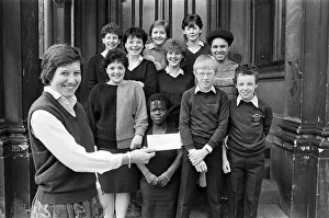 Teacher Miss Sally Cox displays a £65 cheque for the Huddersfield Hospice Appeal Teacher Miss Sally Cox displays a £65 cheque for the Huddersfield Hospice Appeal