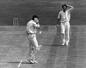 Ted Dexter batsman receives ball from Australian fast bowler Dennis Lillee Ted Dexter batsman receives ball from Australian fast bowler Dennis Lillee