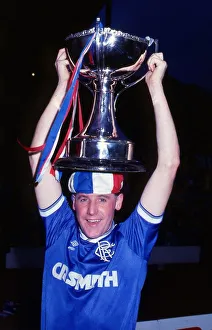 Ted McMinn with League Cup trophy on head October 1986 Ted McMinn with League Cup trophy on head October 1986