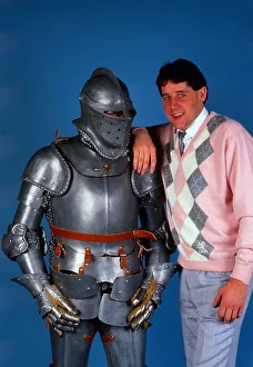 Ted McMinn leaning on suit of armour October 1986 Ted McMinn leaning on suit of armour October 1986