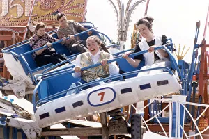 Teenagers enjoying one of the fairground rides at the Crock Fair, Coventry 30th May 1994 Teenagers enjoying one of the fairground rides at the Crock Fair, Coventry 30th May 1994